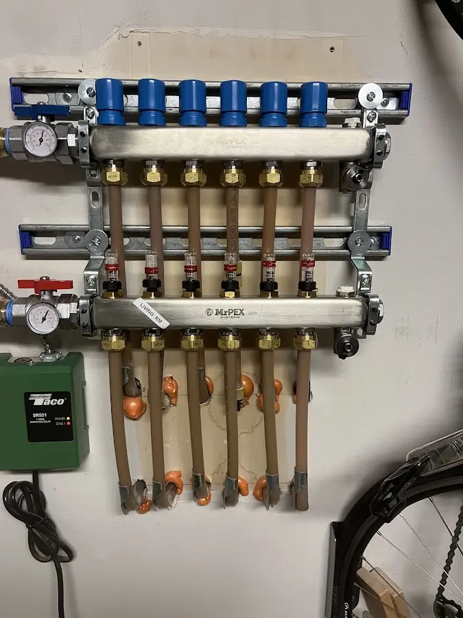 Plumber performing Water Heater Repair at a residential property in Commercial